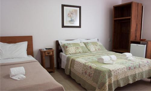 Pero Hotel | Pousada Encantos do Peró