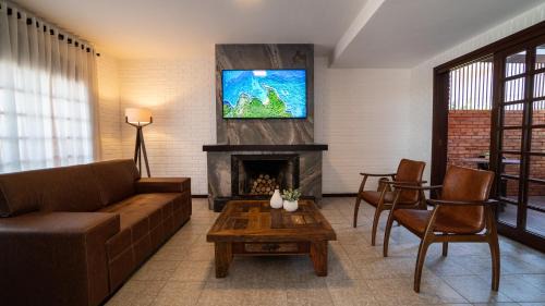 Torres Hotel | Pousada Lua Bella