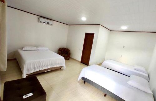 Caravelas House | Pousada Oliveiras