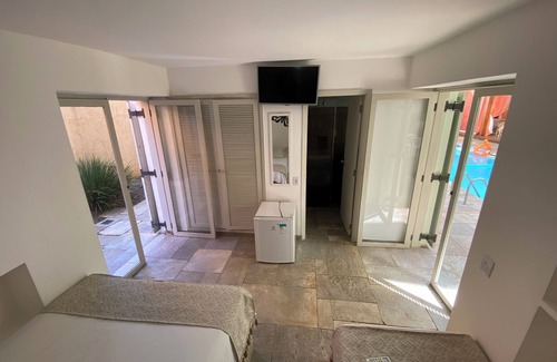 Balneario Praia do Pernambuco Hotel | Pousada Pé na Areia Guarujá