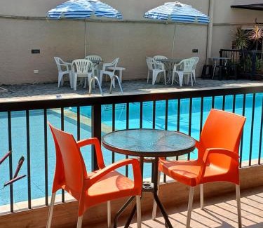 Enseada Hotel | Pousada Parque Suites - Estacionamento e Piscina