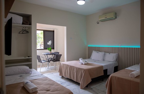 Jardim Virginia Hotel | Pousada Sol da enseada Guarujá