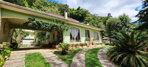 Quitandinha House | Pousadinha Lá em Casa