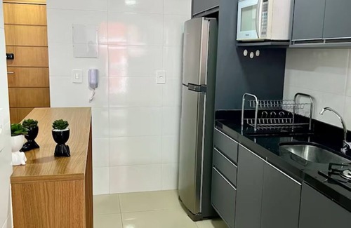 Praia Grande Apartment | Praia Grande Paradise! Feet in the sand! Facing the Sea.