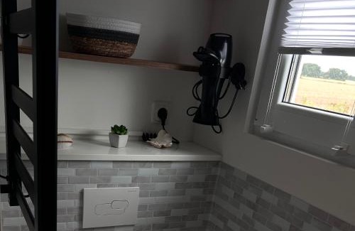 Arbshagen Apartment | Prima Resort Boddenblick - Camping-Stellplätze - Tiny Houses & Ferienwohnungen in Ostsee Nähe