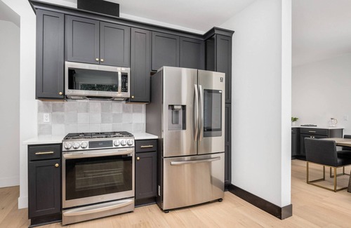 Mississippi District House | Pristine Renovation w/Epic Location, Pet Friendly, Fully Fenced, Hot Tub, Walk to Bars, Shopping