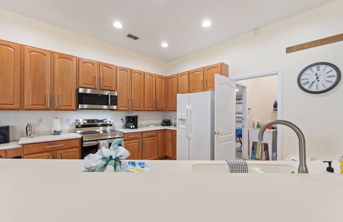 Highlands Reserve Villa | Pristine sunset villa with golf course views. and 15 minutes from Disney.
