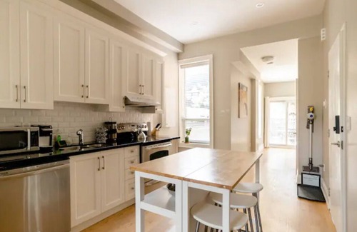 King West Village House | Private: Bright & Cozy w Patio and 12ft Ceilings