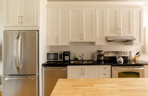 King West Village House | Private: Bright & Cozy w Patio and 12ft Ceilings