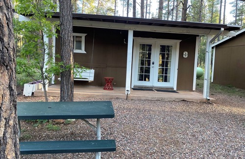 Payson Cabin | Private Cabin in the Pines– Indoor Jacuzzi, Fireplace, Kitchenette, Porch Swing.