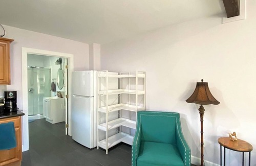Makaha Apartment | Private, country living modern conveniences. Tropical farm, steps from the beach