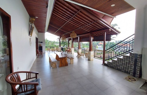 Melayang House | Private cozy bedroom with a spacious shared deck and spectacular view