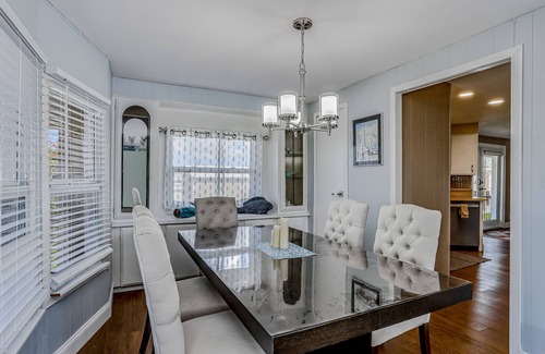 Goodland House | Private Dock, Boats & Bikes Charming Canal-Side Condo w/Screened Porch