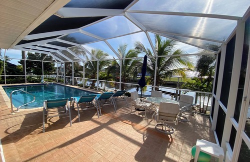 Edgewater House | Private Dock & Heated Pool. No Bridges! 10% Off Weekly & Monthly. Pet Friendly.