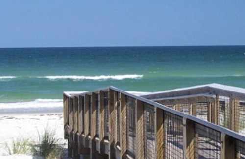Apalachicola House | Private King Room with outdoor entrance, deck, and private bathroom.