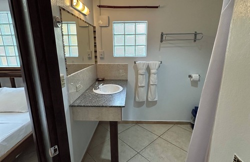 Hopkins Hotel | Private Orchid Room w/AC @ All Seasons Belize