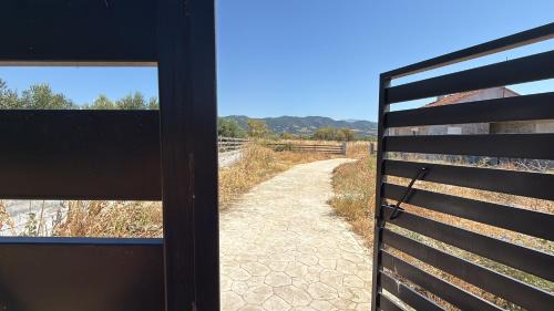 Amphipolis Other | Private Parking for Cars, Vans, Campers, Bus, RV, Trailer & Caravan with Easy Access to Expressway & Main Road - Quiet Location with Mountain Views, Near the Beach, with 2 Lose Guard Dogs, No Water or Electric, No Shower or Toilet - Self Check-in