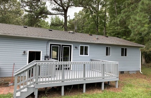 Fentress House | Private single family home with a natural wooded setting providing much privacy.