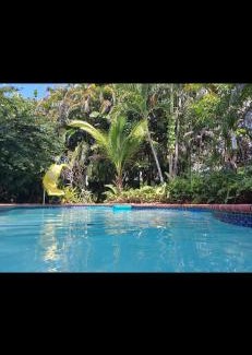 Poinsettia Heights Apartment | Private studio with pool and a jacuzzi near beach