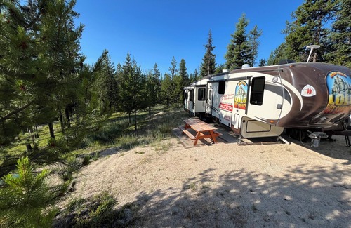 Lolo House | Private Wooded Camp site with fully equipped fifth wheel above Lolo Hot Springs