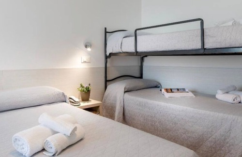 Cagnona Hotel | Quadruple Room, Rich Breakfast Included