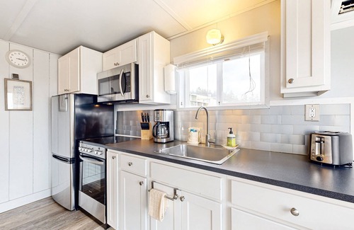 Netarts House | Quaint oceanfront hideaway with open layout, fireplace, central AC, & gas grill