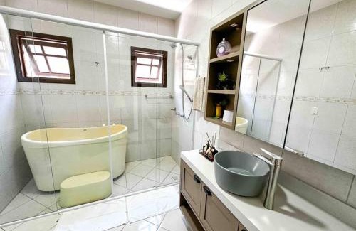 Ze Amandio Bed & Breakfast | Quarto 1 - Hospedaria Orquídeas de Bombinhas - com delicioso café da manhã incluso