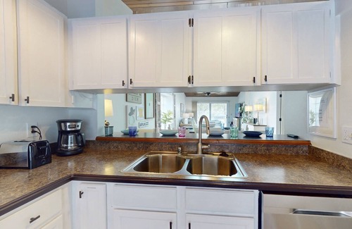 Capri Isle Condo | Quiet Community in the Heart of Treasure Island. Heated Pool. Comfortable and Spacious Townhome.