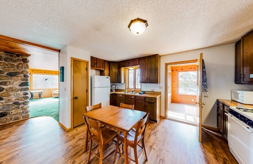 Lac du Flambeau House | Quiet lakefront home with dock, canoe, & sunroom - dog-friendly