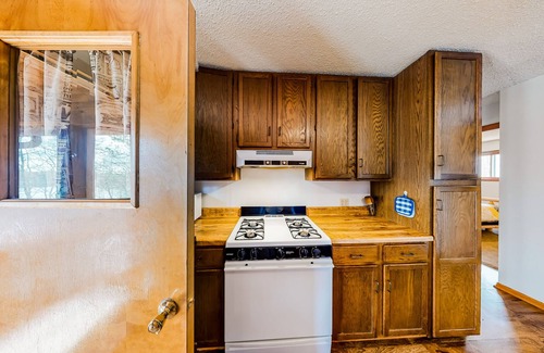 Lac du Flambeau House | Quiet lakefront home with dock, canoe, & sunroom - dog-friendly