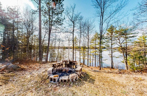 Lac du Flambeau House | Quiet lakefront home with dock, canoe, & sunroom - dog-friendly