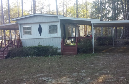 Navarre House | Quiet trailer in the woods 5 miles from Navarre Beach. PET FRIENDLY! FREE WIFI!