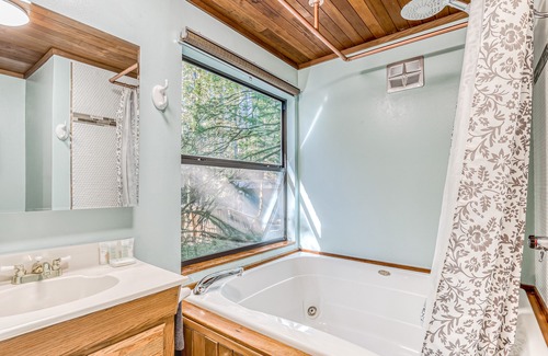 Washougal Cabin | Quiet waterfront cabin on an acre lot with private hot tub & river access