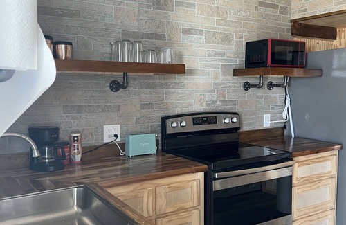 Wichita Falls Cottage | Quietly Nestled Mini Home