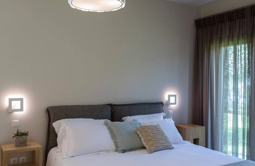 Agios Matthaios Villa | R 3250 Villa Hampton With Bath Amenities ,Coffee Facilities & Garden View.