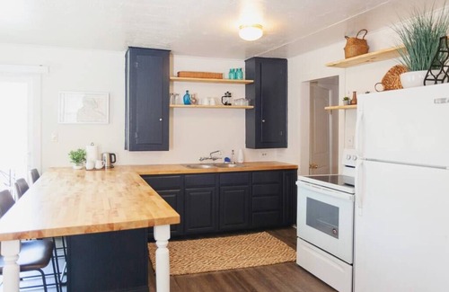 Gold Hill Cottage | R&R on the Rogue River! This 2 BR cottage in Gold Hill features a private hot tub with stunning scenic views. Enjoy a spacious, private setting perfect for relaxation, adventure, or remote work