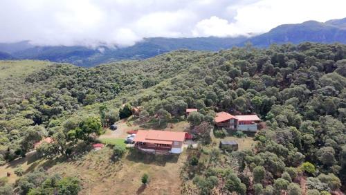 Aiuruoca House | RECANTO DO LEÃO