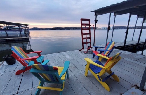 Lake Ozark House | Recent remodel! And your own covered boat dock with sectional sofa & fire table!