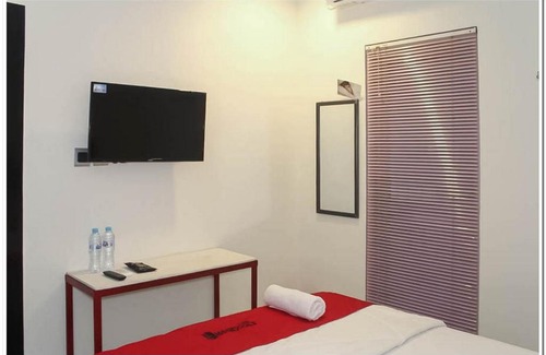 Palangkaraya Hotel | RedDoorz @ Paus Raya