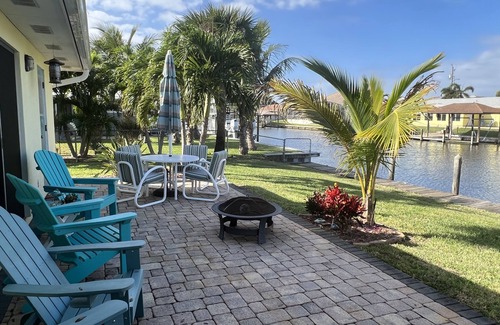 Sunnyland Beach House | REDUCED PRICE!3 BR CANAL FRONT w/river/ocean access & beach! Bring boat!