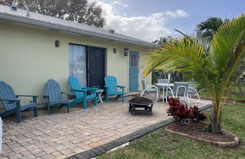 Sunnyland Beach House | REDUCED PRICE!3 BR CANAL FRONT w/river/ocean access & beach! Bring boat!
