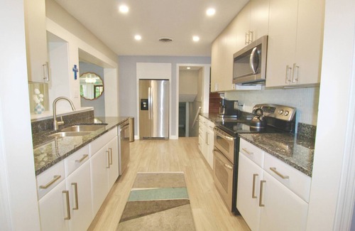 Stuart House | Reduced Rates! 4BR/3BA Home - Heated Pool - - Close to Beach and Historic Downtown Stuart!