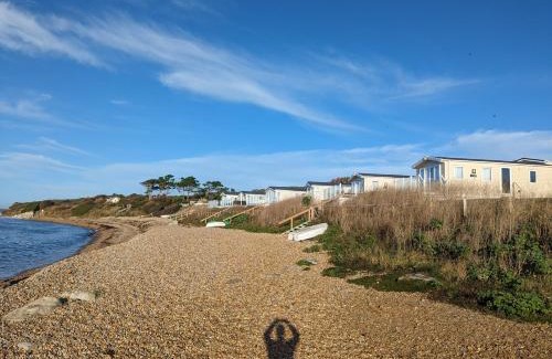 Holworth Resort | Regal Beachside pitch 22 Creek Caravan Park