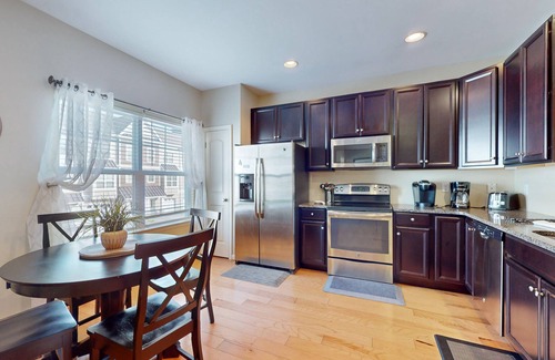 Rehoboth Beach House | Rehoboth Crossing townhome - pool & gym - dog-friendly, fireplace & private W/D