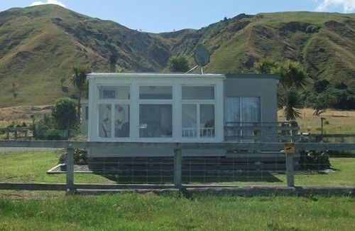 Glenburn House | Relax and unwind in this little cute bach.