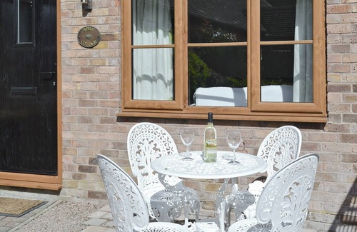 Munslow Cottage | Relax in front of the woodburner in this single-storey barn conversion.
