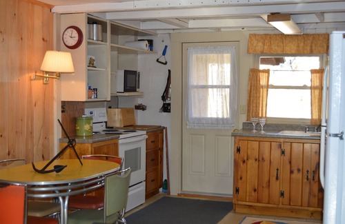 Wells Cottage | Relax in this comfy Log Cabin after your short walk back from the beach