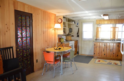 Wells Cottage | Relax in this comfy Log Cabin after your short walk back from the beach