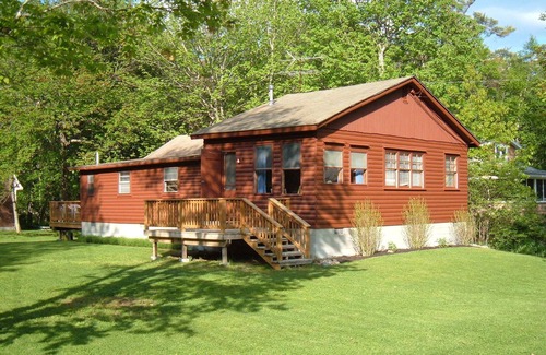 Wells Cottage | Relax in this comfy Log Cabin after your short walk back from the beach
