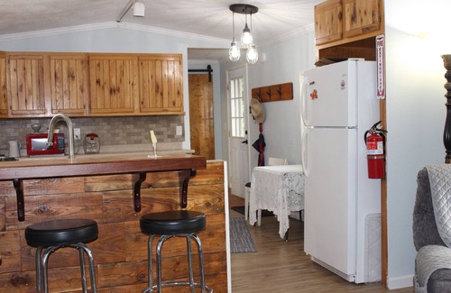 White Sulphur Springs House | Relax & unwind in the mountains with a beautiful view of Newlan Creek Reservoir